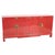 Mid-20th century modern chinoiserie red lacquered four-door buffet or server, featuring a bold, streamlined silhouette...