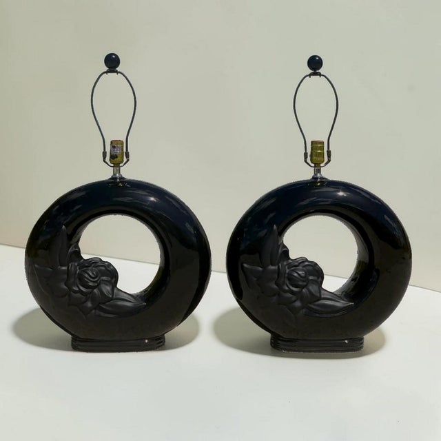 Beautiful pair of vintage table lamps. Large black cylindrical lamps, in a gloss black porcelain finish, with matte black...