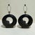 Beautiful pair of vintage table lamps. Large black cylindrical lamps, in a gloss black porcelain finish, with matte black...