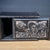 A striking carved hardwood sliding drawer box, its front panel featuring a deeply carved flying dragon in relief — a bold,...