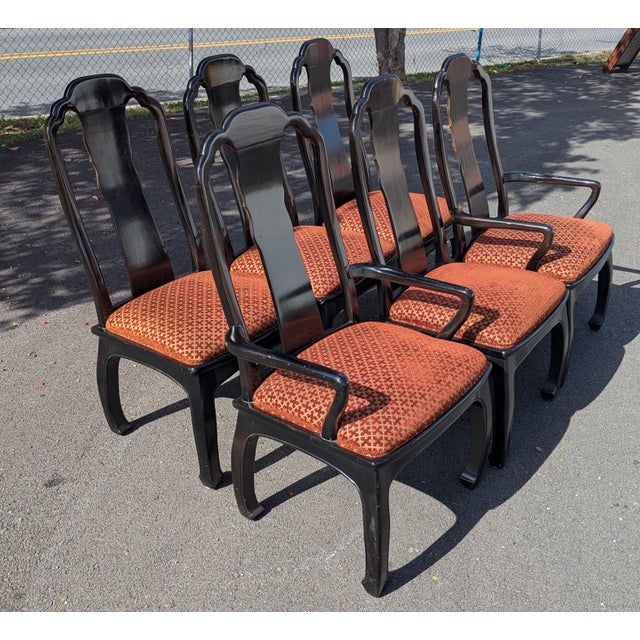 Mid century black dining chairs featuring ming styling, diamond pattern upholstery