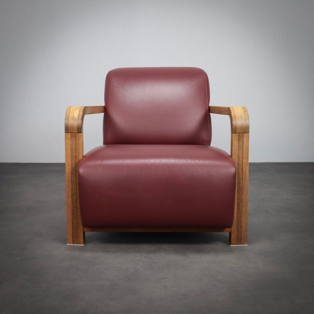 A pair of Hemingway lounge chairs designed by Hugo de Ruiter, showcasing the designer’s talent for combining comfort with...