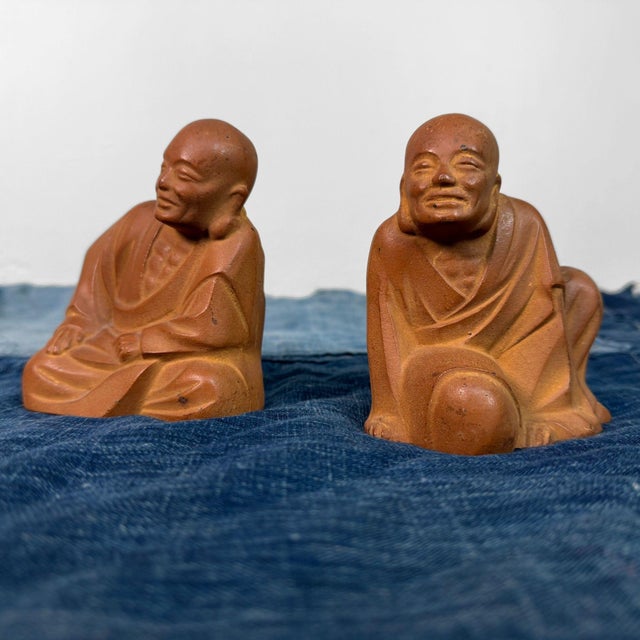 These figures are made from stone with a soft, matte surface, giving them a calm yet expressive presence. Dimensions per...