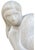 Striking hand-carved stone sculpture of a reclining female nude, rendered in a beautifully simplified, abstract modernist...