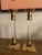 A pair of Mid-Century Modern Lucite and Brass Candle Holders or Candlesticks. Brass in original condition. Some wax...