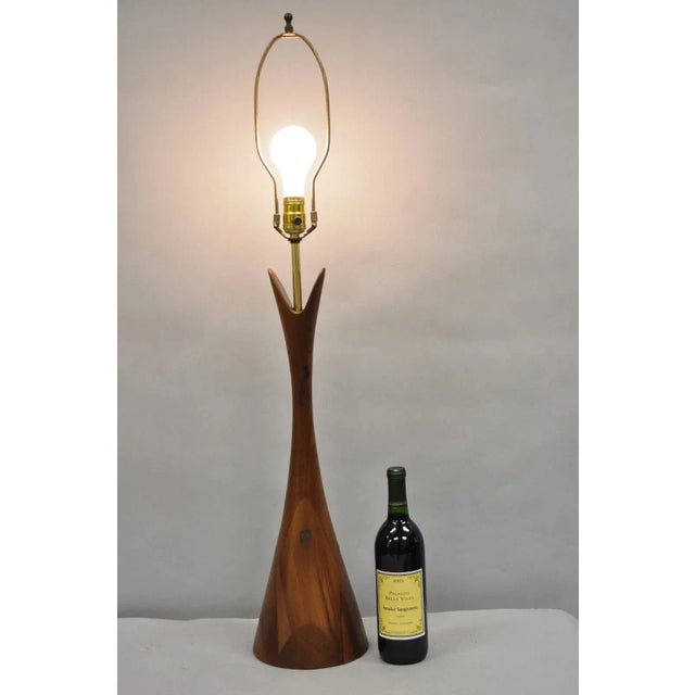 Vintage Mid Century Modern Sculptural Walnut Wood Danish Modernist Table Lamp by Modernera Mfg Co. Circa Mid 20th Century....