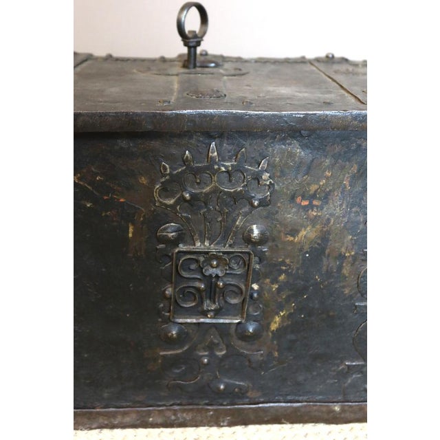 Nuremberg wrought iron chest, cut and assembled with rivets and screws. The chest was the quintessential piece of...