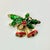 A lovely Antique Christmas Brooch from the 1920s. It features two gold Bells with a red rim on each. They are clustered...