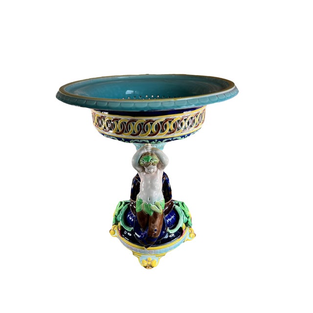 A spectacular 19th-century French or Italian majolica centerpiece, hand-painted with vivid colors and rich sculptural...
