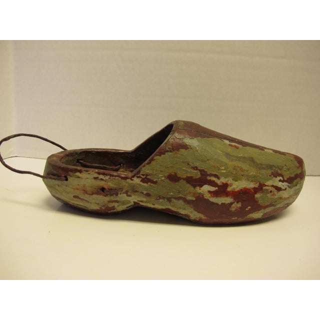 Very cool quirky folk art. Layers of flaky paint add to the interest of this shoe mold. I love the fact that someone but a...