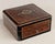 A 19th Century French Napoleon III marquetry box, hand-crafted of walnut and burl veneers with ebonized trim. Fine mother-...
