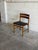 Beautiful vintage Danish modern dining chair crafted in teak with clean Scandinavian lines and elegant minimalist...