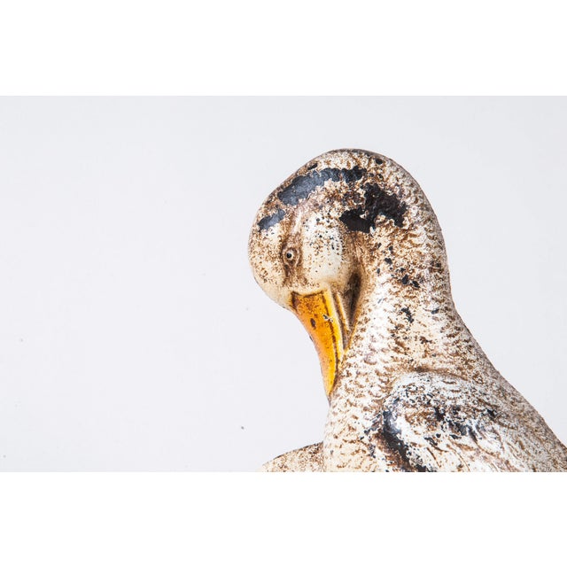 Cast iron ducks doorstop Flat-back, hollow body Original paint Probably Hubley First half 20th century