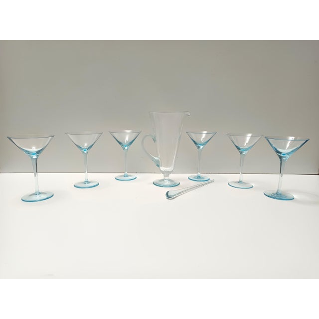 Made in Italy by La Murrina, 1980s. This set features 6 glasses, a pitcher and a stirrer. They are made in light blue...