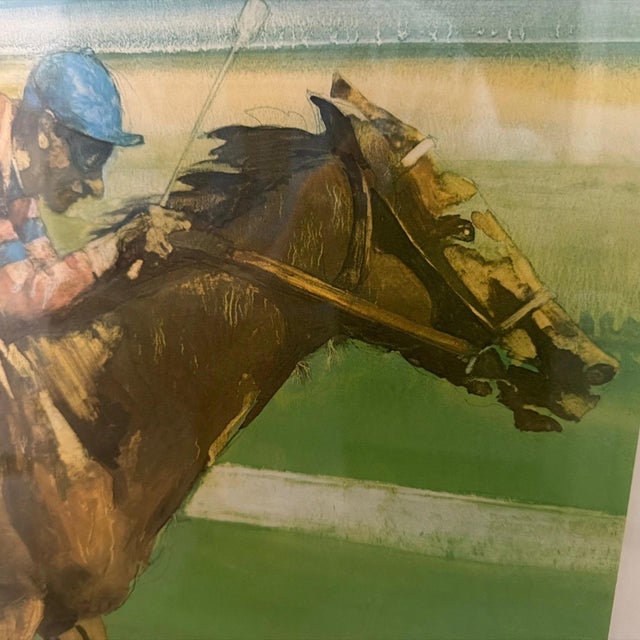 The product is a limited edition print featuring Eddie Arcaro, a legendary jockey in horse racing, who won the Triple...
