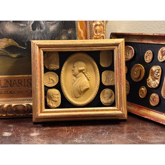 The Classical Regency Grand Tour Intaglio Shadow Box Set including large oval Profile of Josiah Wedgwood. Giltwood shadow...