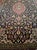 A fine hand-knotted Qum Kurk Super rug, crafted in Iran from superior wool and featuring exquisite craftsmanship. The rug...