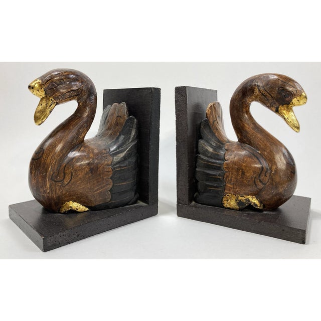Vintage hand-carved wooden bird motif bookends featuring wonderful gilt detailing to bill and feet. Mounted to L-shaped...