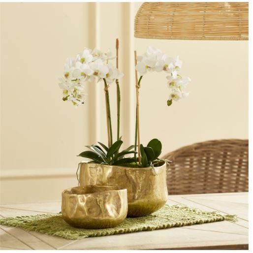 The Amelia Gold Cachepot - Set Of 2 With a modern, organic shape and natural hammered texture, this set of two cachepots...