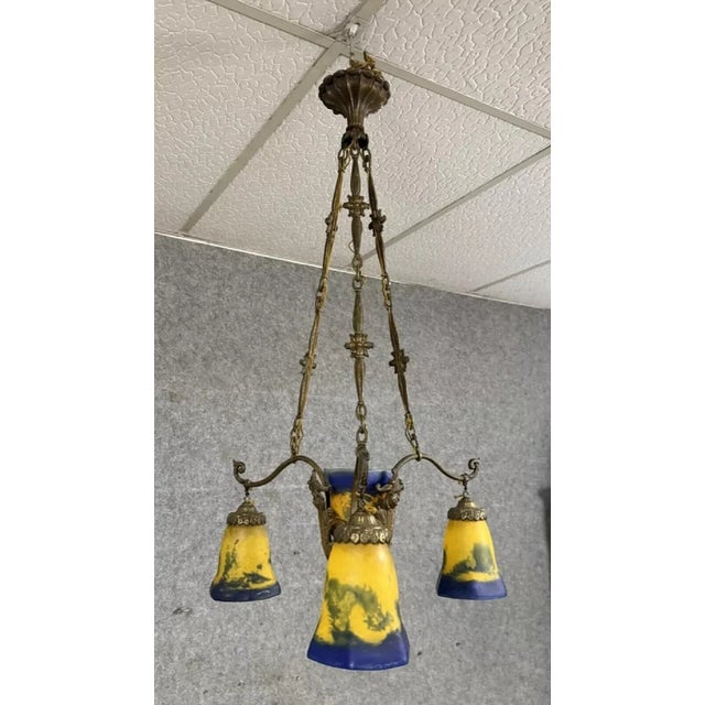 Art Nouveau Bronze and Glass Paste Chandelier attributed to Muller for Lafite, 1900, in Good conditions. Designed 1890 to...