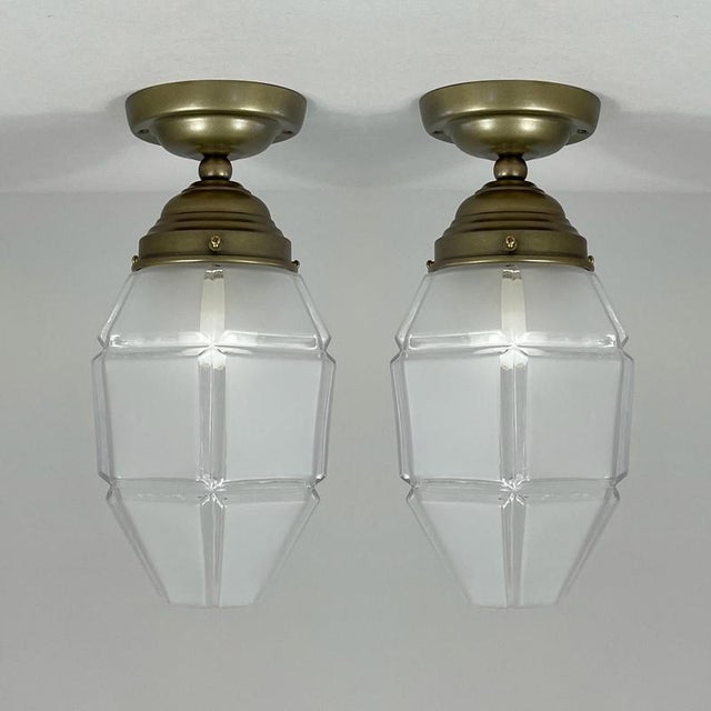 These elegant flush mounts were designed and manufactured in Austria in the 1920s to 1930s. The lights feature a matching...
