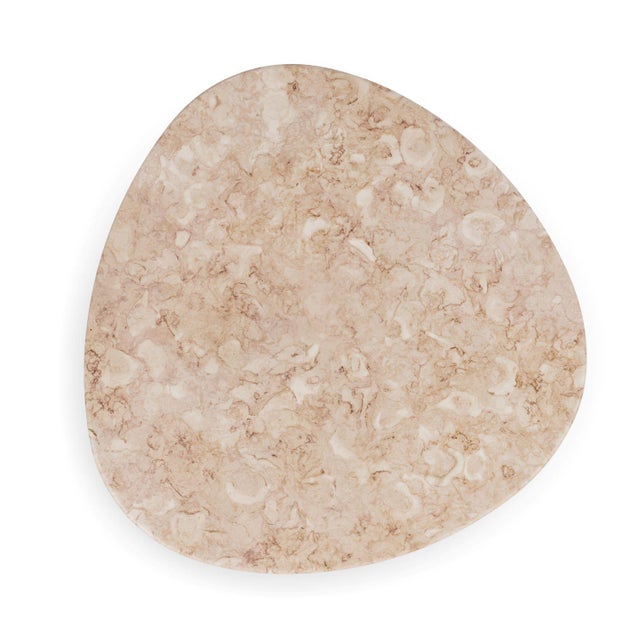 The AITAI table extends the spirit of the chair into a shared surface. Inspired by its triangular seat, the table takes on...