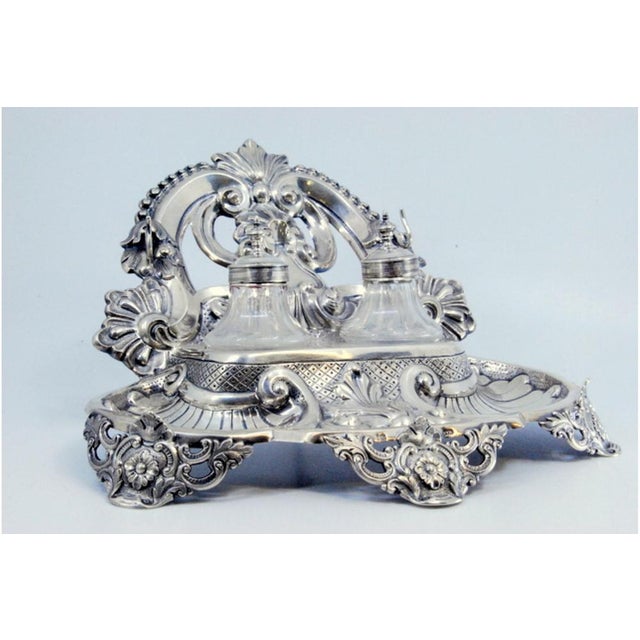 Cut Silver Inkwell with Scrolls and Shells, in Very Good conditions. Designed before 1890 This piece has an attribution...