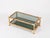 Stunning and unique mid-century coffee table in bamboo and brass with glass shelves. This elegant piece was produced in...
