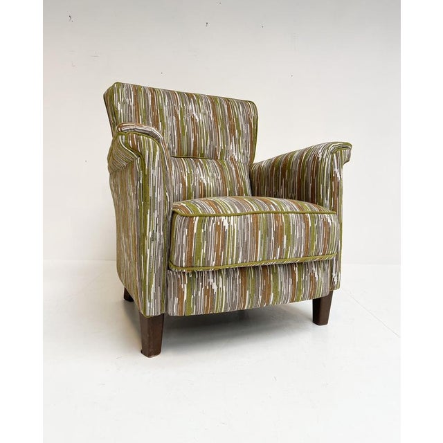 These armchairs have that delightful retro look reminiscent of chairs from Grandma’s day, yet with a surprisingly...