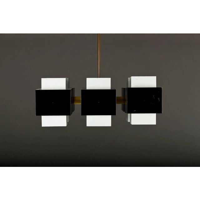This vintage chandelier was designed by Hans-Agne Jakobsson during the 1960s and produced by Markaryd in Sweden. It...
