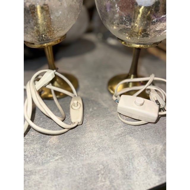 A rare pair of original mid-century table lamps from west germany, dating from the late 1960s to the 1970s. The lamps...