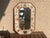 This stunning piece is an authentic 1930's Spanish hand-painted accent mirror, showcasing a timeless folk art style. The...