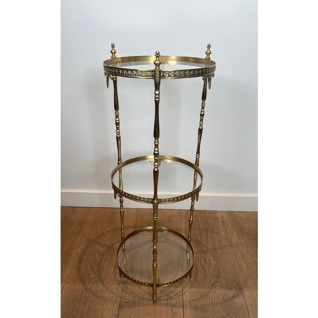 1940s 1940s Round brass pedestal table with three glass shelves. French work Attributed to Maison Jansen For Sale - Image 5 of 9