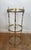 1940s 1940s Round brass pedestal table with three glass shelves. French work Attributed to Maison Jansen For Sale - Image 5 of 9