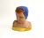 Midcentury Italian terra-cotta sculpted putto bust with vibrant colors mixing high gloss and matte finishes. Signed by the...