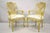 Vintage Italian Provincial French Louis XV Style Yellow Cane Dining Arm Chairs - a Pair. Item features cane backs, solid...