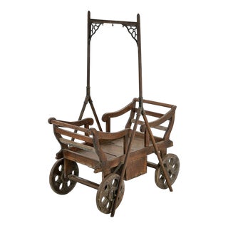 Wooden Rolling Child's Cradle For Sale