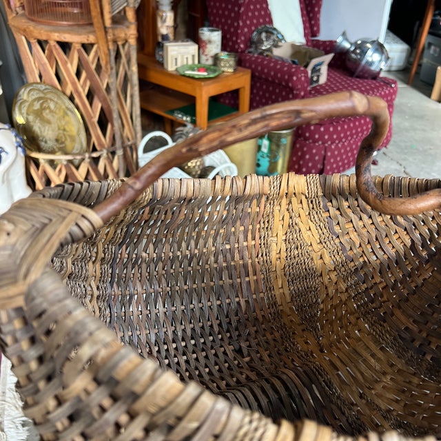 Up for consideration is a beautiful vintage hand woven primitive wicker butt/melon basket. This would look lovely in your...