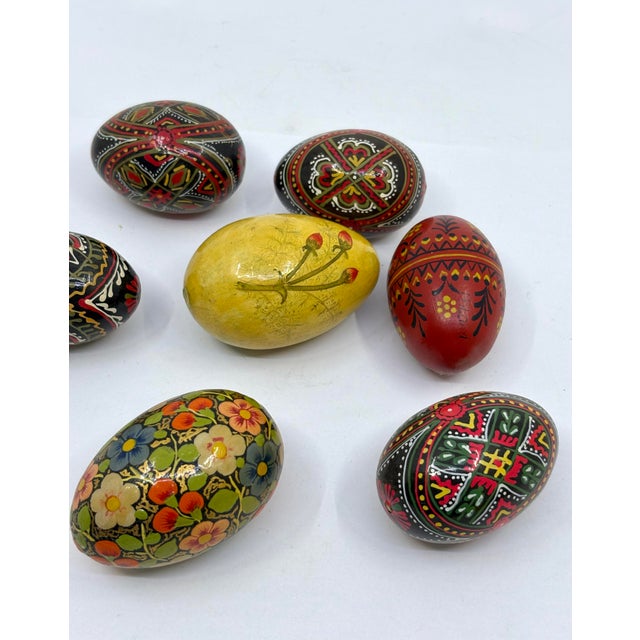 Hand painted wooden Easter eggs. Colorful design and details mostly in red and black. Signed made in Poland on one egg. I...