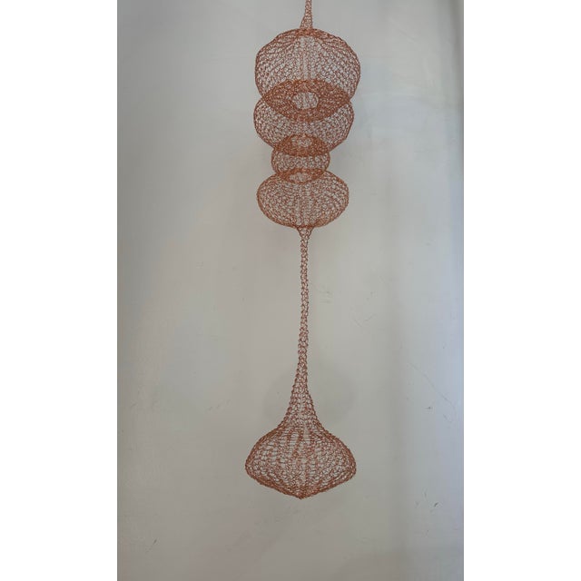 Copper wire sculpture inspired by the hand woven technique of Ruth Asawa.