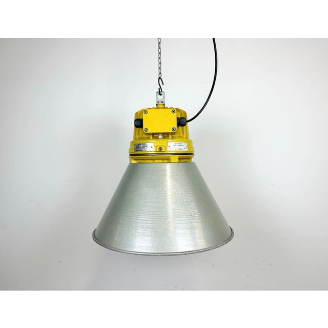 Industrial factory pendant light manufactured by elektrosvit in czech republic during the 1990s. It features a cast...