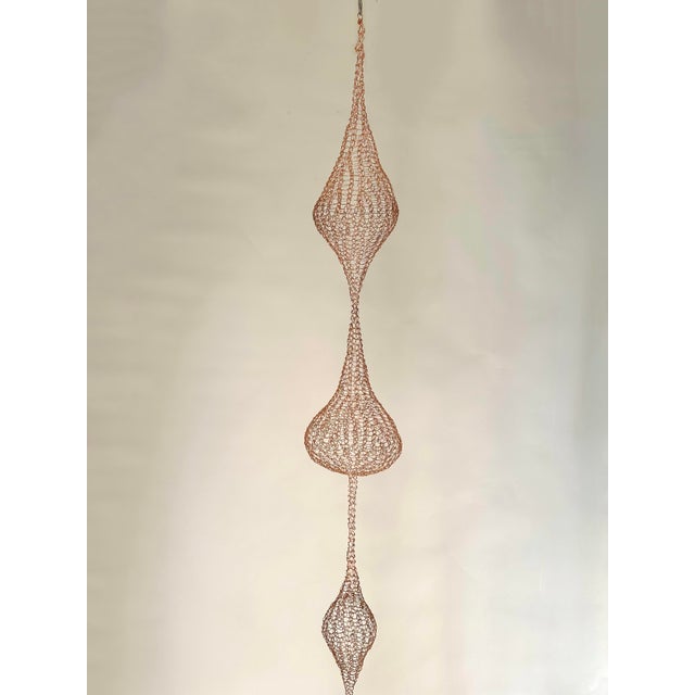 Handmade copper wire sculpture inspired by the hand woven wire techniques of Ruth Asawa.