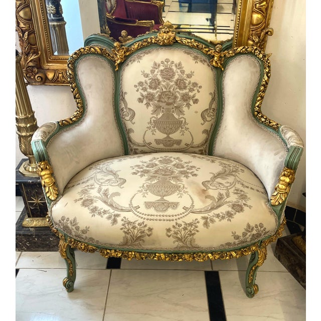 Bring romantic French elegance to your home with this charming petite settee, featuring beautiful ivory-beige upholstery...