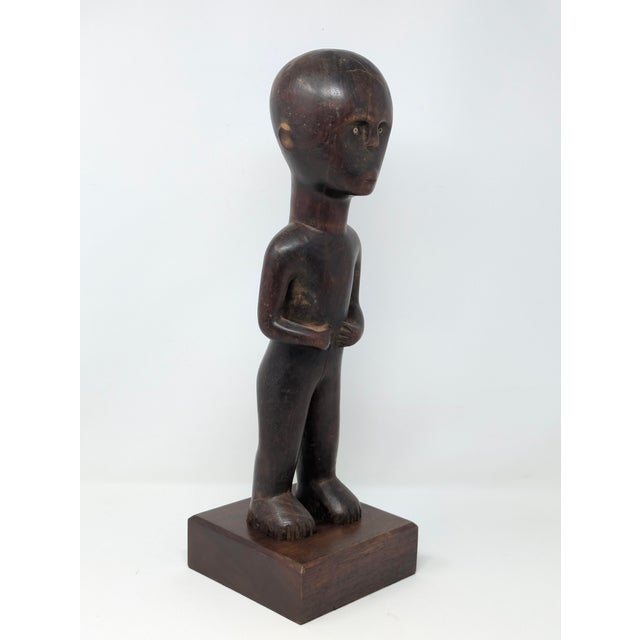 Traveling Man Treasures is selling this traditional Nyamwezi tribal hand-carved male ancestor figure from Tanzania. The...