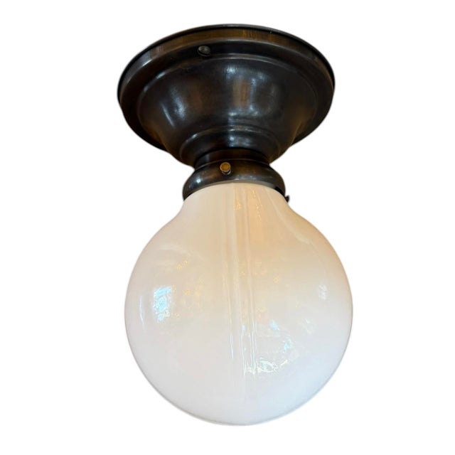 Such a great light for a bathroom, kitchen or any small room or space. Milkglass on original flushmount holder with great...