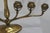 A lovely Tiffany gilt bronze six-arm candelabra from the Art Nouveau period. Six candle sconces are raised on supports....