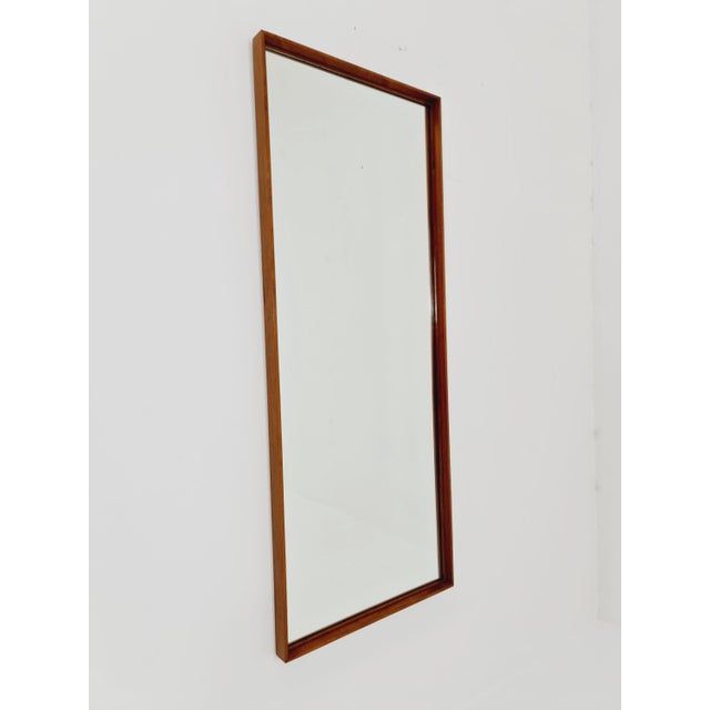 Big Teak German mid-century Modern wall-mounted mirror , 1960s Made in Sweden Materials: teak Height: 119 centimeters...