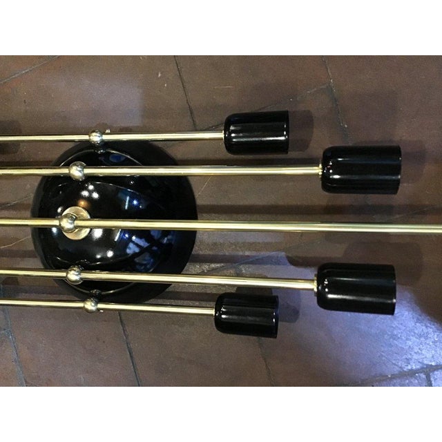 Evocative and scenographic, these rare art deco wall lights come from a prestigious roman hotel and represent a perfect...