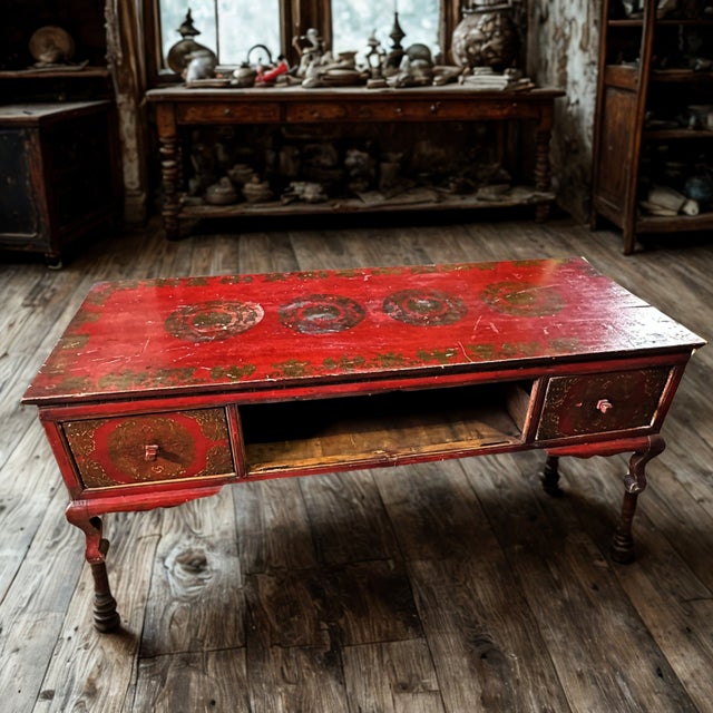 This vintage mid 20th century Chinese low-profile Kang table is a richly detailed and highly functional piece,...
