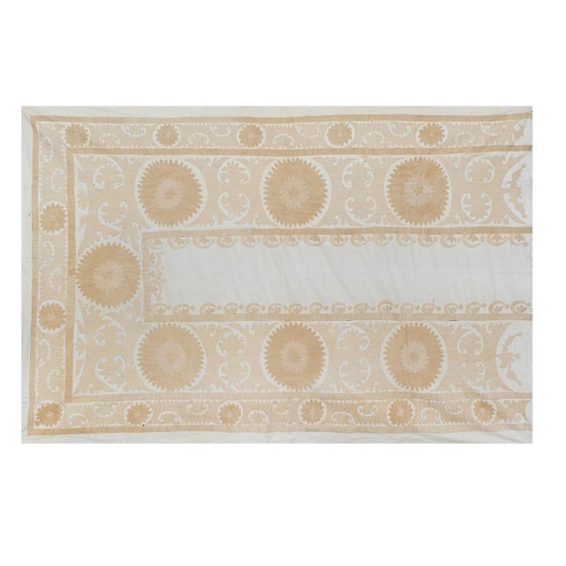 "Vintage Suzani from Samarkand, circa 1900s. There are few tears and pen marks on this suzani While this suzani is in...